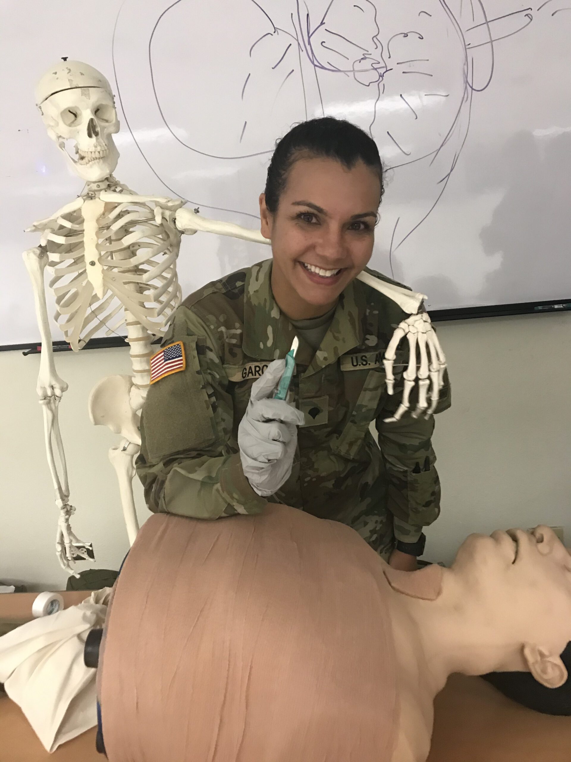 Rebeca Elizabeth training in military medical field — systems, precision, and structure in action